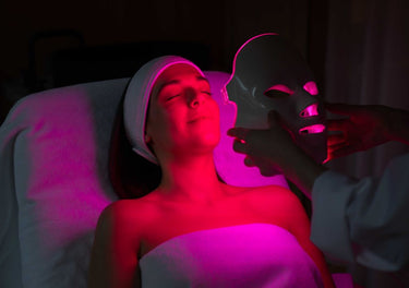 lady using LED face mask, red light therapy